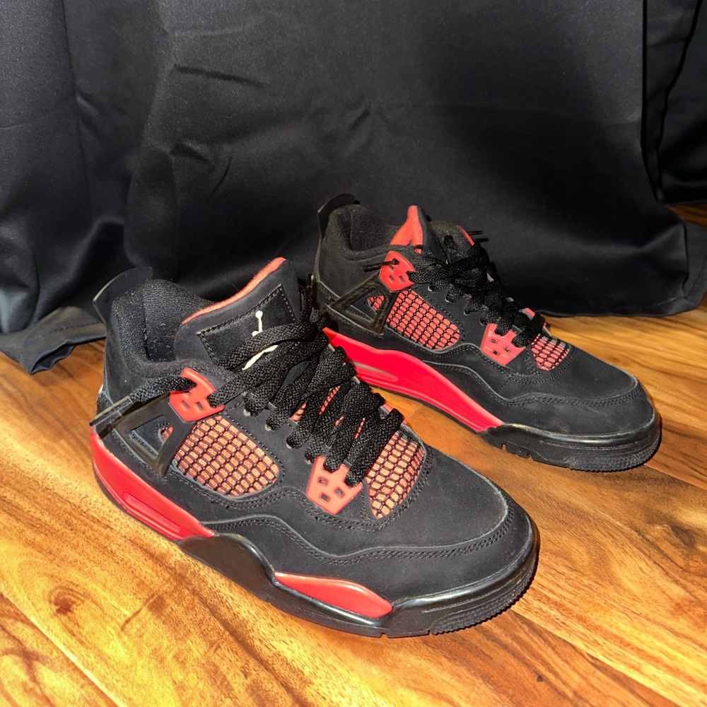 Red thunder Air Jordan 4s